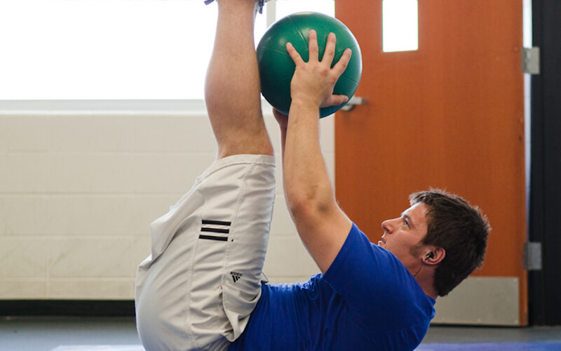 Student uses FH110 for stretching and abdominal exercises